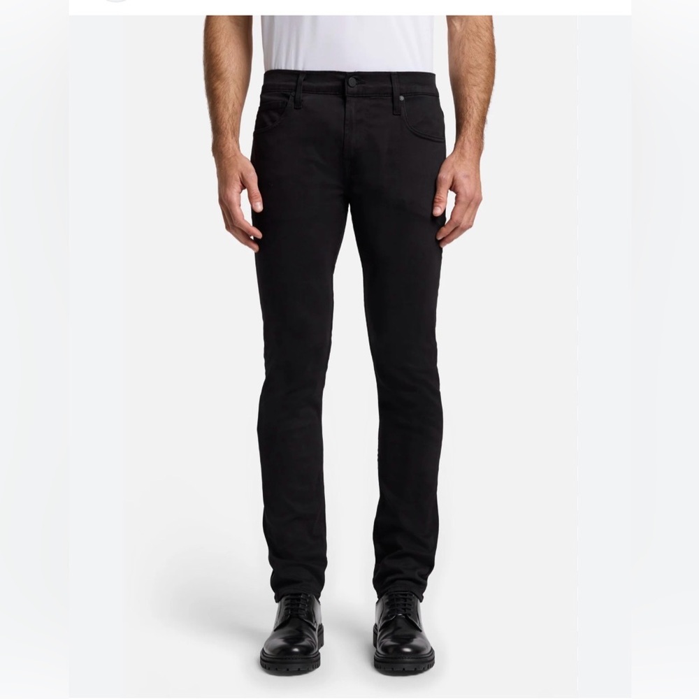 Black denim jeans by the brand 7 For All Mankind